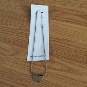 Banana Republic half circle silver necklace.
